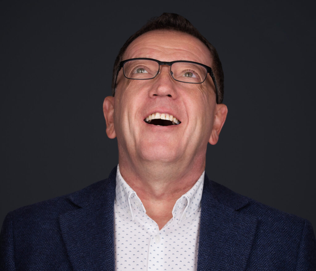 A man laughing with Fort Worth Headshots